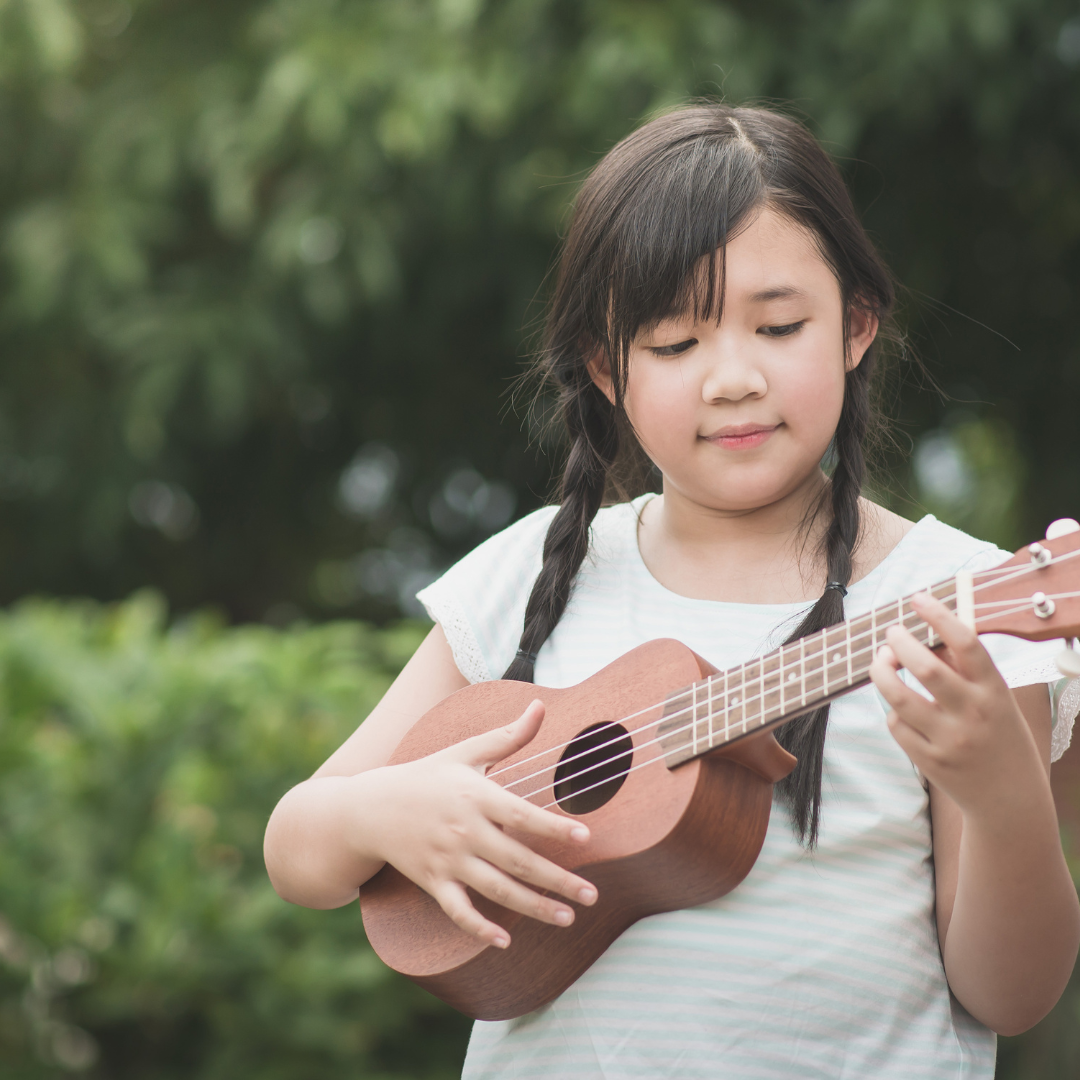 Young music student practicing an instrument