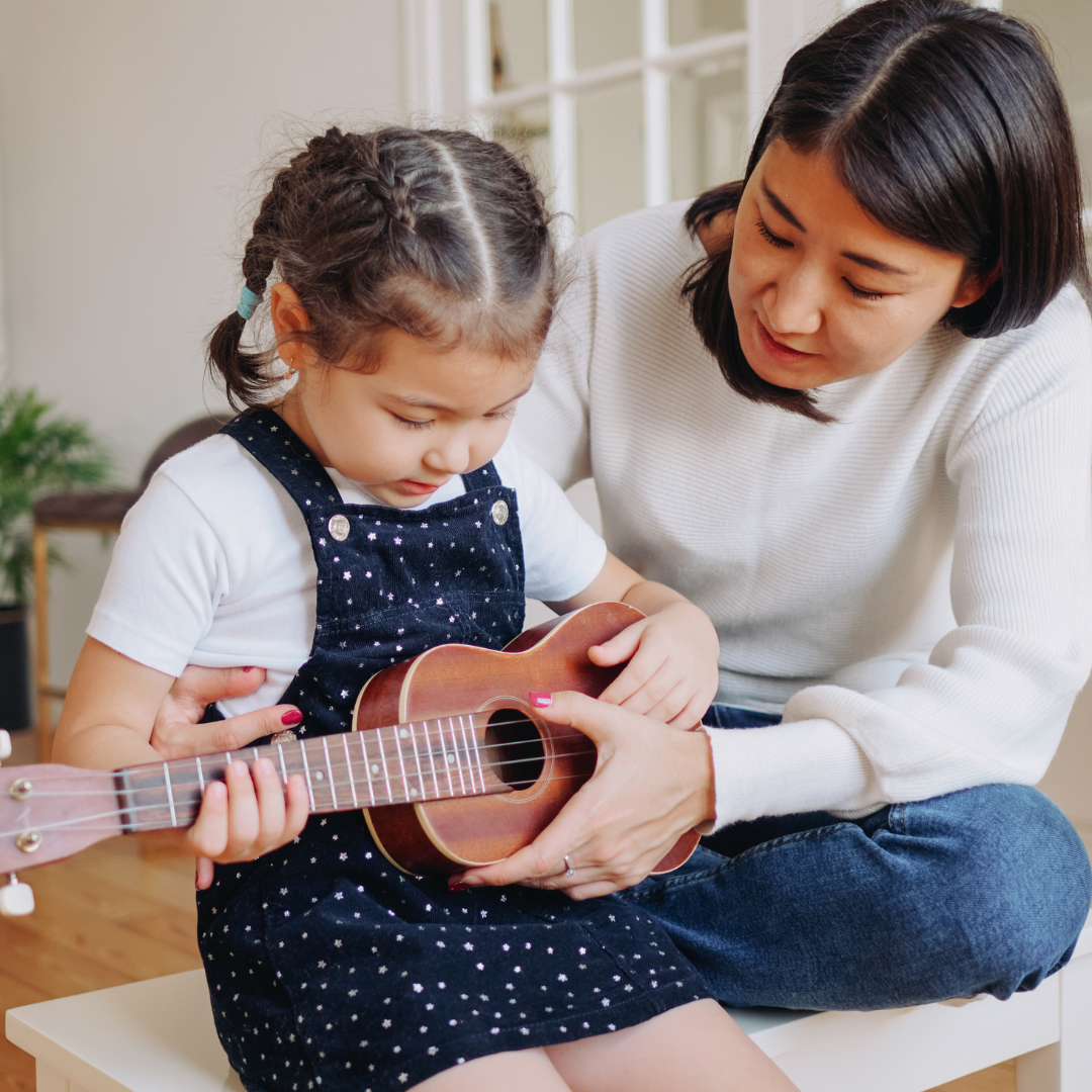 Student enjoying a private music lesson