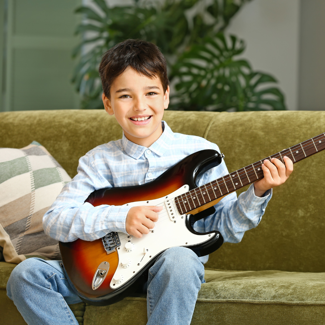 Music teacher giving a private lesson – teach with us throughout Greater Boston and MetroWest